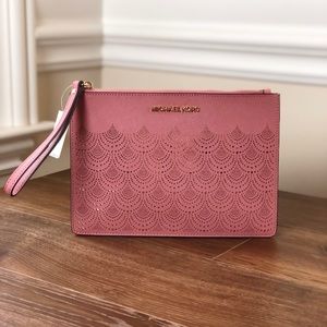 NWT Michael Kors large perforated wristlet